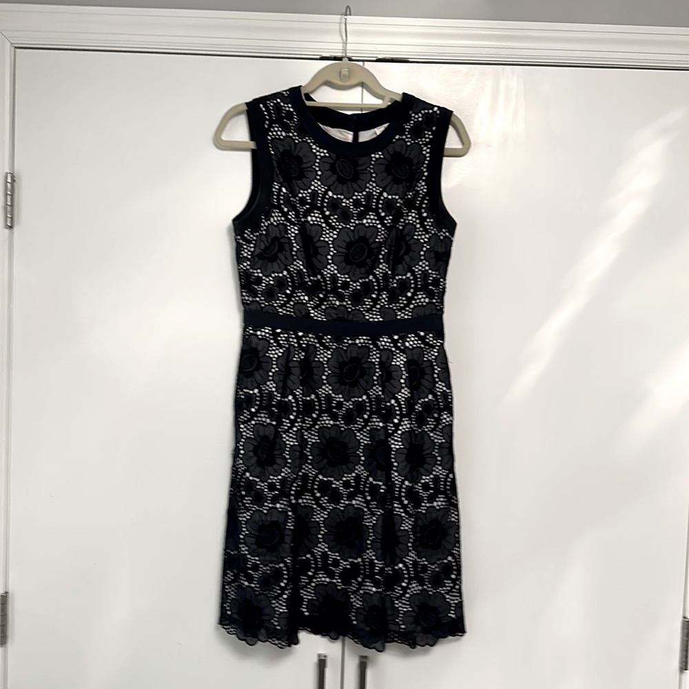 Beautiful navy lace like with cream underlay, fit and flare.